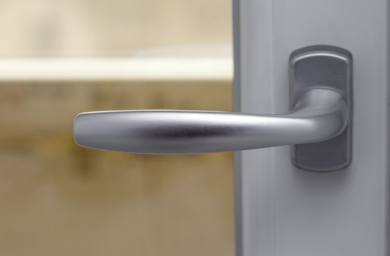 New and modern silver door handle - close up view